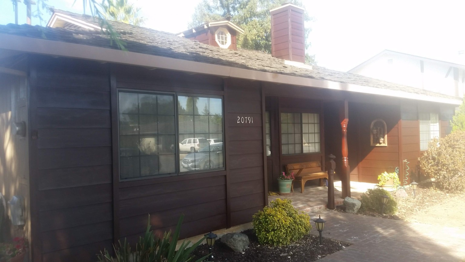 Completed dark exterior house painting project