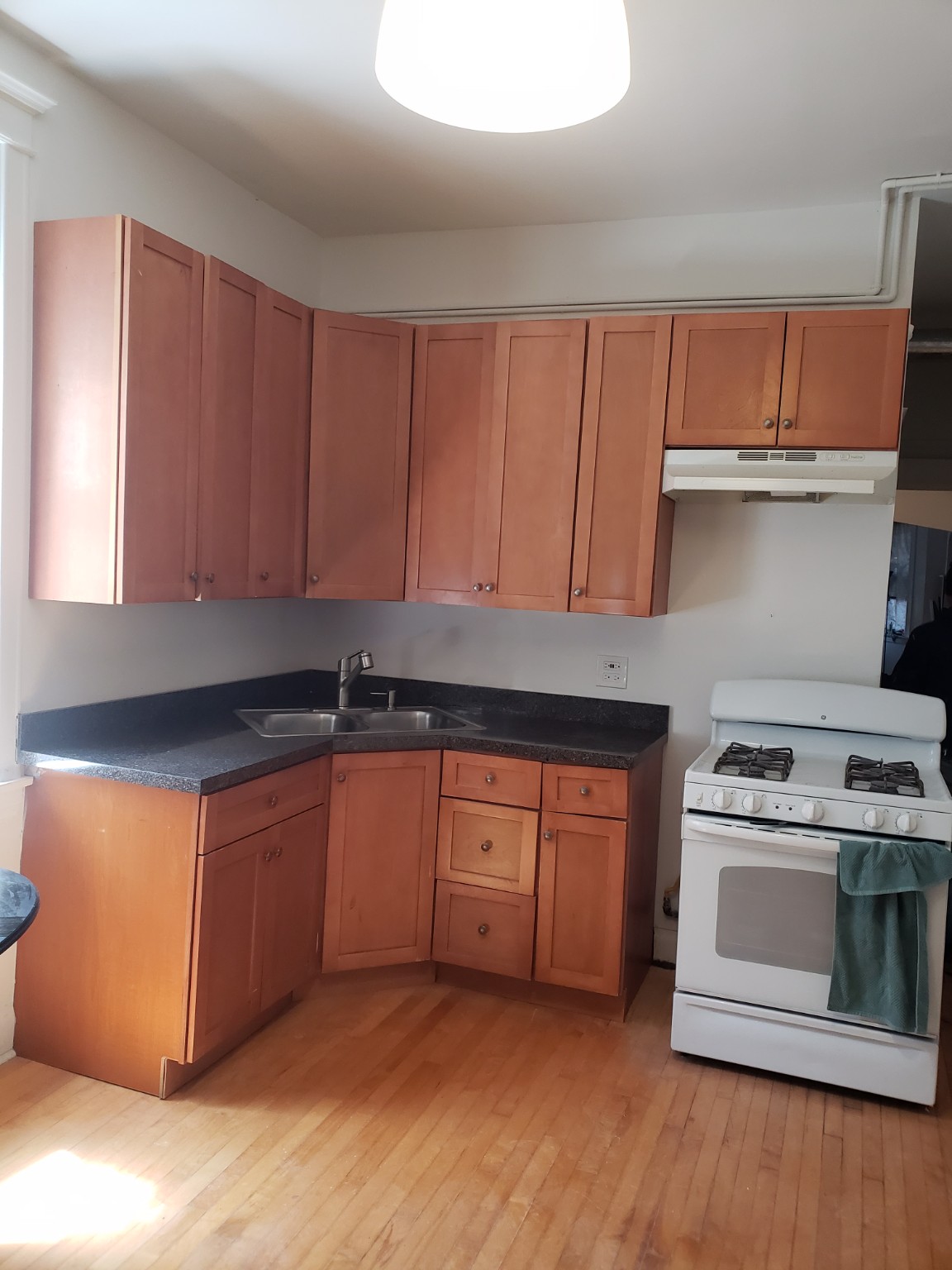 Completed kitchen cabinet and appliance installation